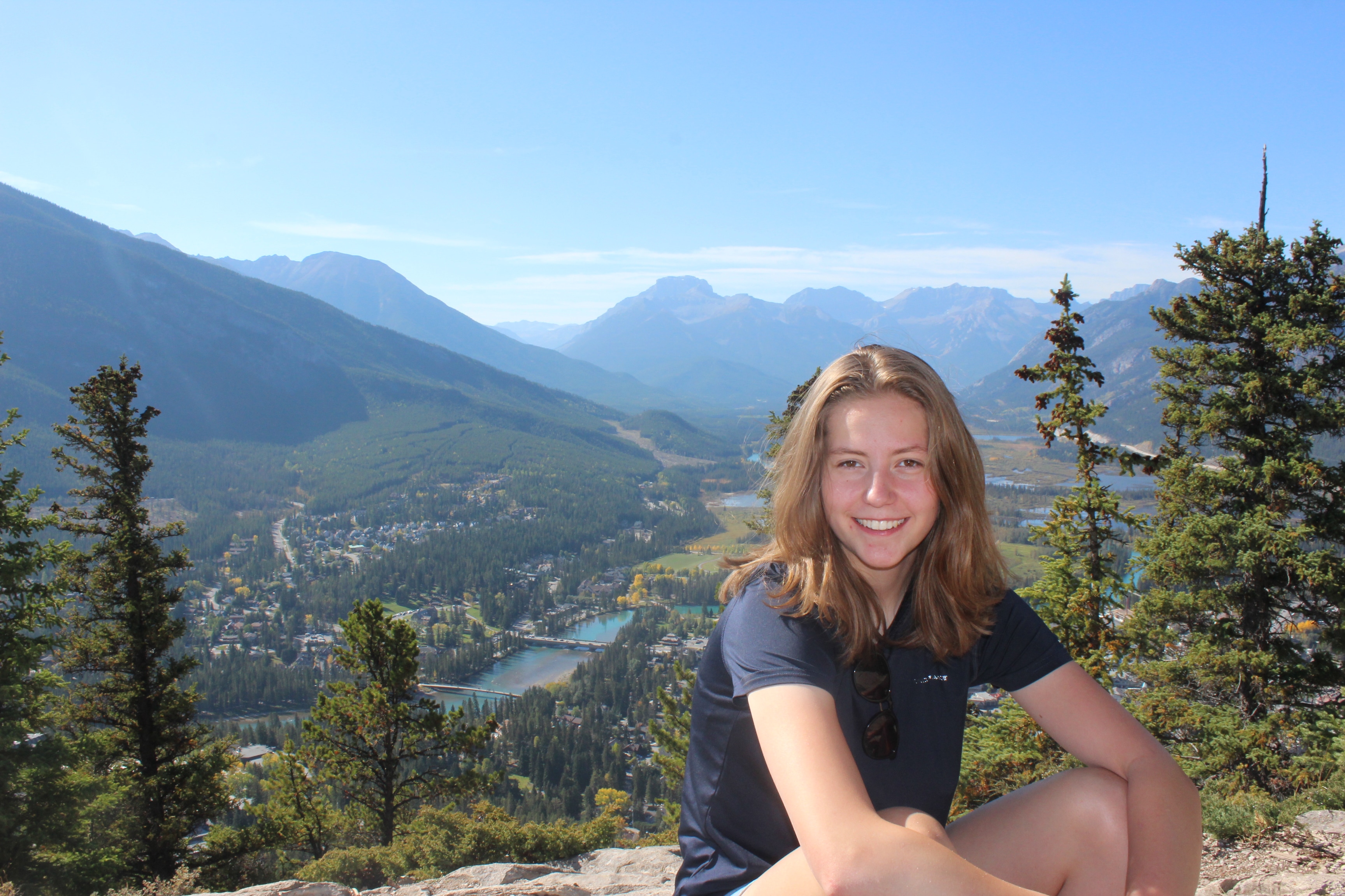 Hiker overlooking Banff townsite and the Bow River